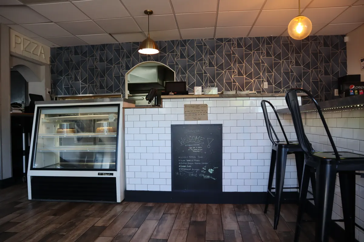 The pizza oven and counter inside Stavros