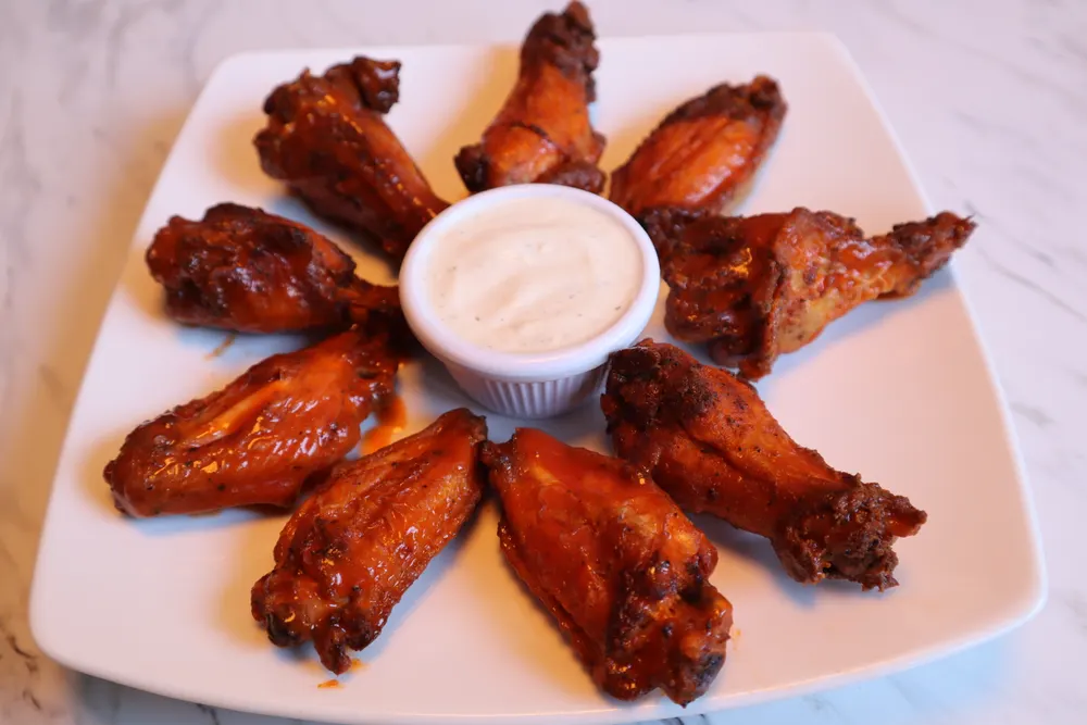 Buffalo wings served with a side of ranch